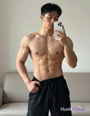 Asian adult man with light to medium tan skin and short straight black hair, clean-shaven face with 