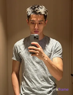 an anonymous figure man with light-medium warm skin and short textured dark hair