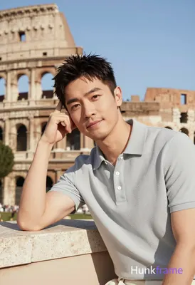 Asian man with short dark textured hair and light stubble in bold flat-color wal
