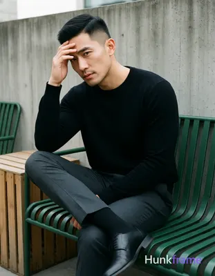 Photograph of exactly 1 adult man. Man 1: Asian, light-medium, oval with defined