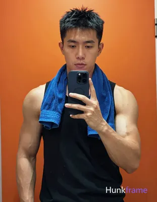 Photograph of exactly 1 adult man. Man 1: Asian, light to medium tan, square jawline with defined ch