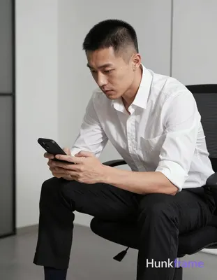 Photograph of exactly 1 adult man. Man 1: Asian, light-medium, oval with defined jawline, short buzz