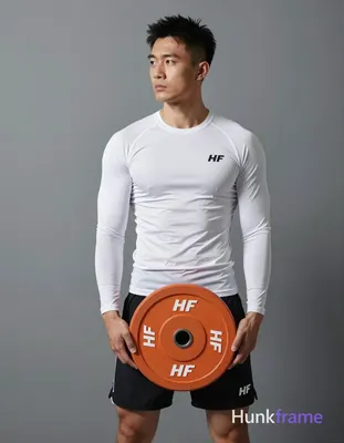 Asian adult man with short black textured hair and clean-shaven face, neutral serious gaze leftward 