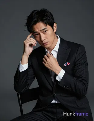 Asian adult man with fair to light tan skin and black short textured hair in a t