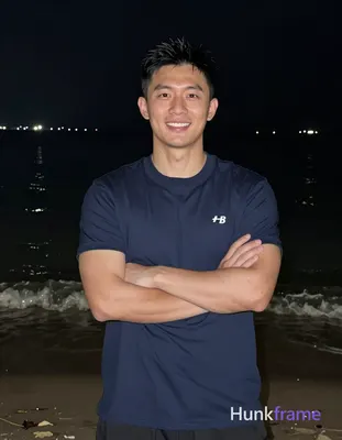 Asian man with light-medium skin and short black hair featuring a textured top a