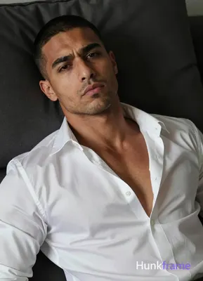 an anonymous figure man with light to medium tan skin texture and pores, short b