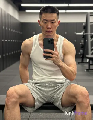 Photograph of exactly 1 adult man. Man 1: East Asian, light-medium, square-jawed