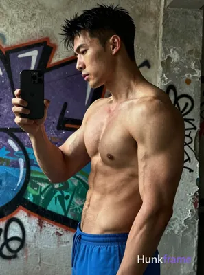 A photoreal portrait of a shirtless muscular man with well-defined chest and arm muscles standing in