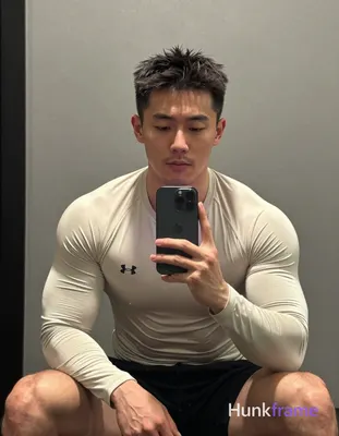Photograph of exactly 1 adult man. Man 1: asian, light-medium, square-jawed with defined cheekbones,