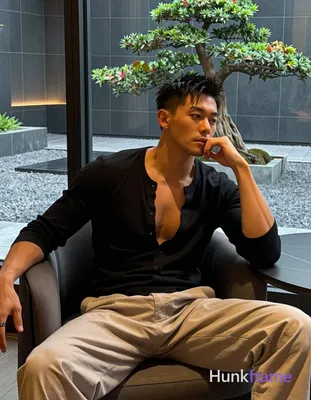 Photograph of exactly 1 adult man. Man 1: East Asian, medium tan with warm under