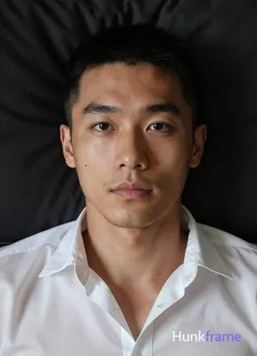 Photograph of exactly 1 adult man. Man 1: East Asian, light to medium tan with n