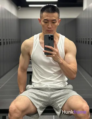 Photograph of exactly 1 adult man. Man 1: East Asian, light-medium, square-jawed