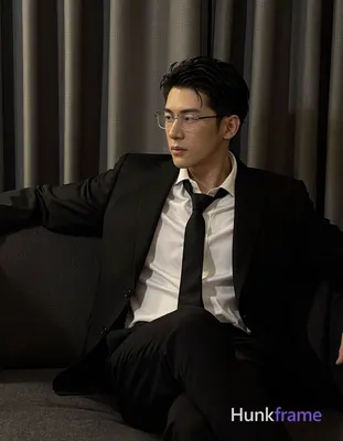 an anonymous figure man with light to medium skin and short textured black hair, wearing rectangular