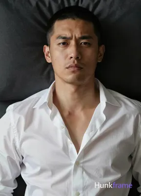 an anonymous figure man with light to medium tan skin texture and pores, short b