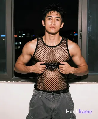 Photograph of exactly 1 adult man. Man 1: Asian, light to medium tan with visible sheen from lightin