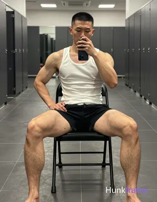 an anonymous figure man with short buzz cut and clean-shaven face, shirtless wea