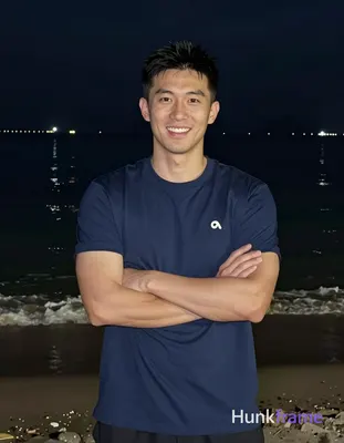 Asian man with light-medium skin and short black hair featuring a textured top a