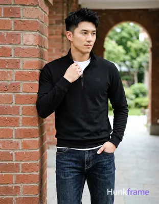 Asian man, light-medium skin, short textured black hair styled upward at the crown with tapered side