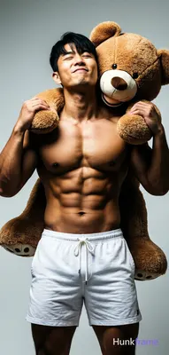 Asian man with medium-tan skin, black short hair with side-swept bangs, clean-sh