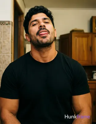 an anonymous figure man with short black hair and upward texture, sparse mustache and chin stubble,