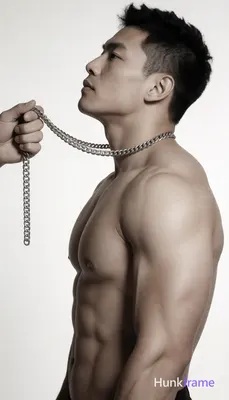 Heavily muscular adult man with substantial muscle mass, wide shoulders, thick neck, large chest and