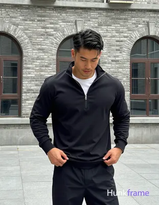 an anonymous figure adult man with light to medium tan skin and short textured black hair styled upw