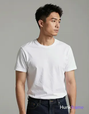 Asian man with light-medium skin and short dark black hair featuring a textured 