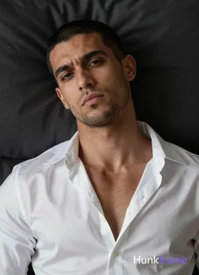 an anonymous figure man with light to medium tan skin texture and pores, short b
