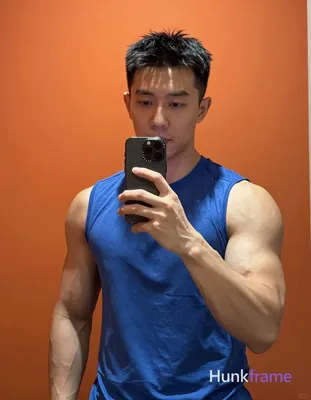 Photograph of exactly 1 adult man. Man 1: Asian, light-medium, oval with defined
