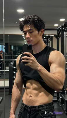 Photograph of exactly 1 adult man. Man 1: Asian, light-medium, oval with defined