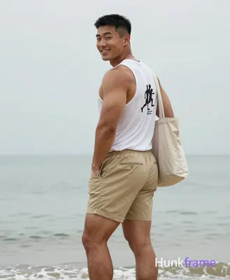 Muscle bear style full-body portrait of Asian man with light-medium tan skin short black buzz cut ta