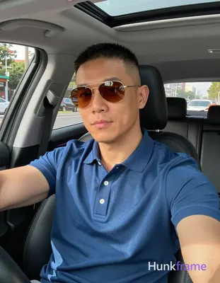 an anonymous figure man with light-medium skin and a short buzz cut featuring black textured top lay