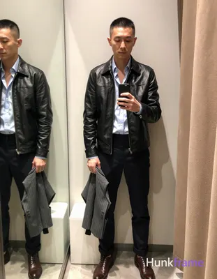Photograph of exactly 1 adult man. Man 1: Asian, light-medium, square-jawed with defined cheekbones,