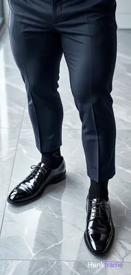 Polished anime style rendering of an adult man standing with legs slightly apart in a top-down verti