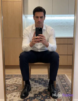 Photograph of exactly 1 adult man. Man 1: light to medium, oval with defined jawline, short, dark br