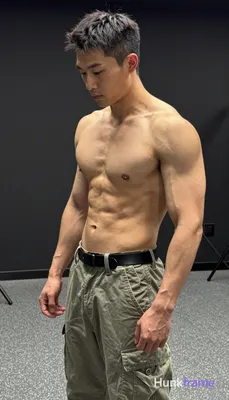 an anonymous figure adult man with short textured crop cut hair featuring dark b