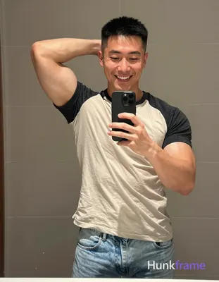 an anonymous figure man with short black buzz cut and high fade stands in front 