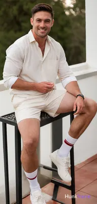 Asian man with light-medium skin and dark brown short hair styled with volume, clean-shaven face gaz