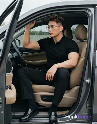 Asian man with light-medium skin and short textured dark brown hair, side parting visible, wearing t
