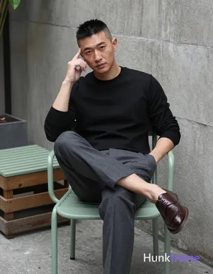 Photograph of exactly 1 adult man. Man 1: Asian, light-medium, oval with defined