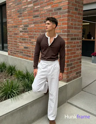 an anonymous figure man with short textured dark brown hair, clean-shaven face, neutral contemplativ