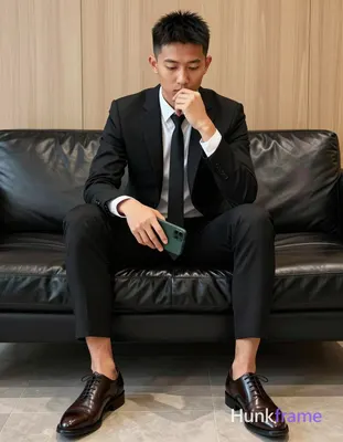 an anonymous figure man with light to medium tan skin and short black quiff hair, clean-shaven face,