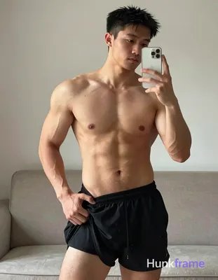 Asian adult man with light to medium tan skin and short straight black hair, clean-shaven face with 