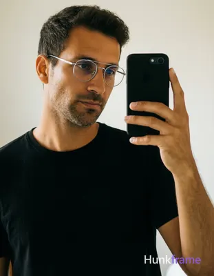 an anonymous figure man with light to medium tan skin sheen standing in front of