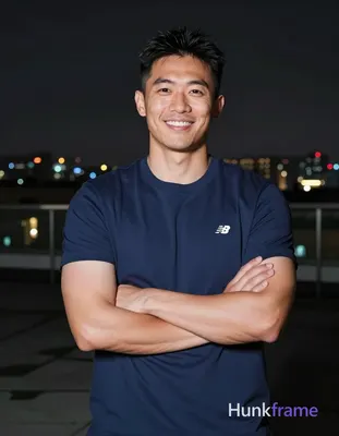 Asian man with light-medium skin and short black hair featuring a textured top a