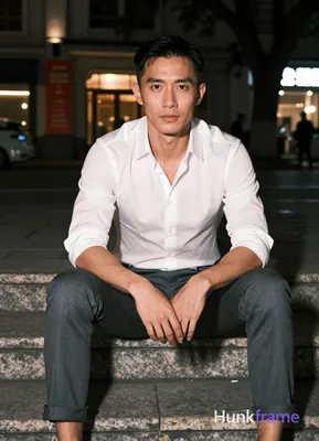 Photograph of exactly 1 adult man. Man 1: Asian, light-medium, oval with defined jawline, short blac