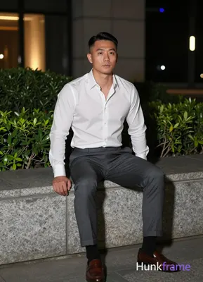 Photograph of exactly 1 adult man. Man 1: Asian, light-medium, oval with defined