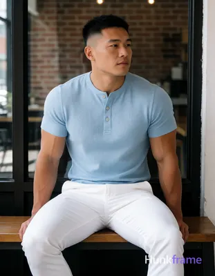 Heavily muscular adult man with substantial muscle mass, wide shoulders, thick neck, large chest and
