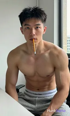 Photograph of exactly 1 adult man. Man 1: Asian, light-medium, square-jawed with