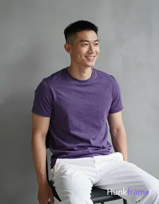 Asian man with short buzz cut black hair high and tight fade sides, clean-shaven